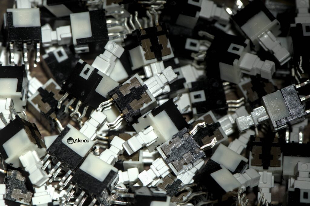 A pile of ALPS SPPH230100 switches.