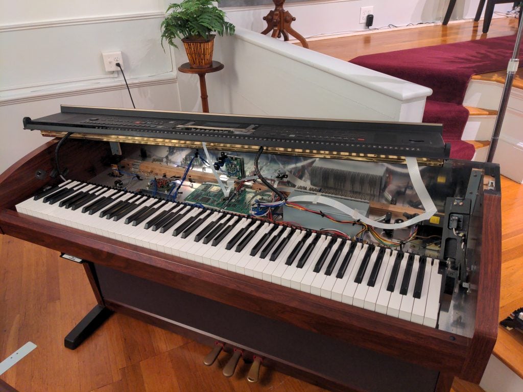 Open digital piano. Hearing aids can alter perceived pitch and tone on digital pianos as well.