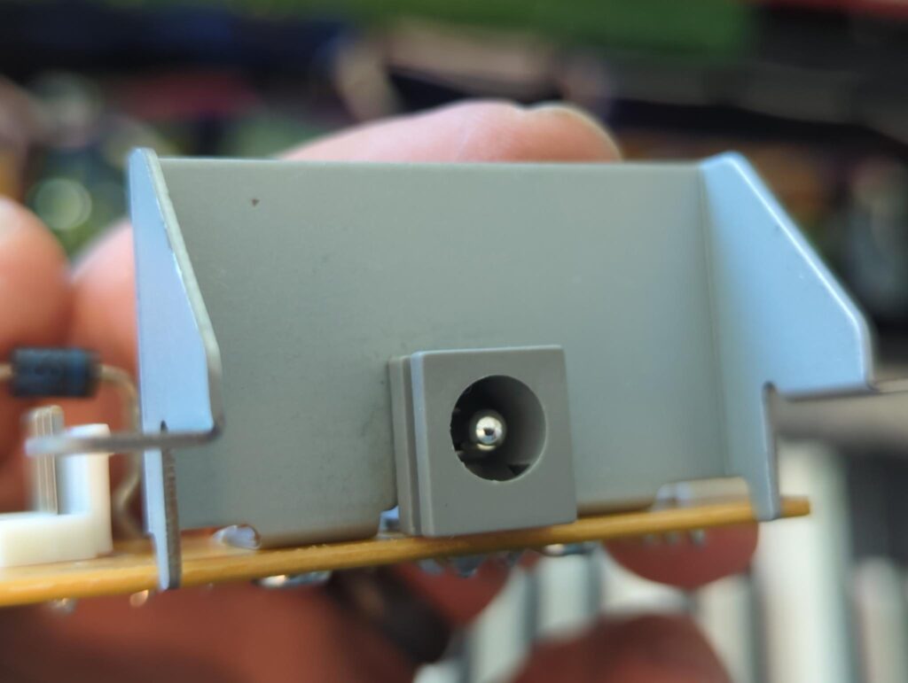 The new power inlet installed on the power inlet board. The dead keyboard is revived!
