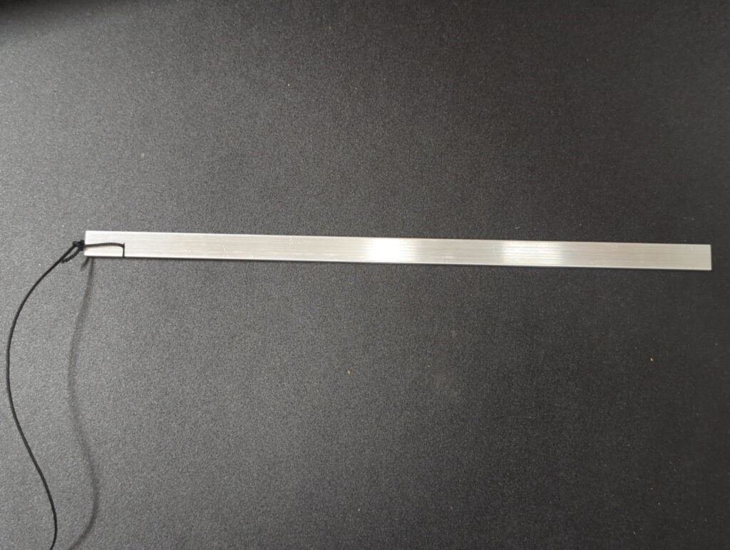 The 1/16" aluminum plate I use, with a little notch in it for the Atwood Nano Cord. It's then easy to pull the felt through with the cord.