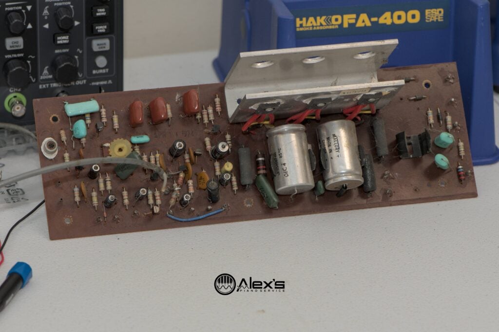 Wurlitzer 200 preamp on a bench.