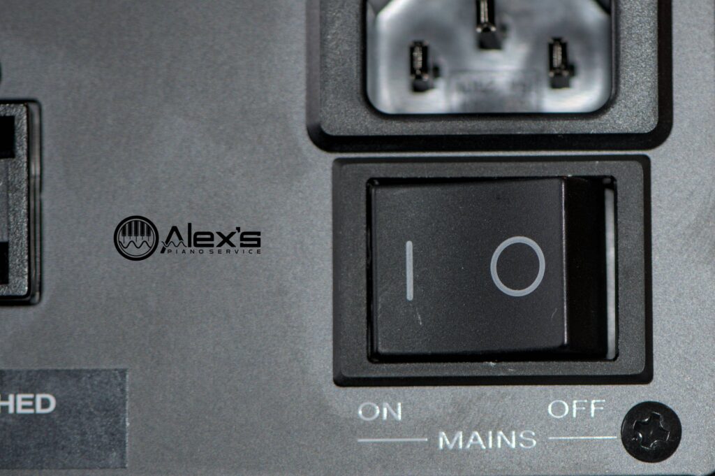 Closeup of Yamaha E3 power supply MAINS switch.