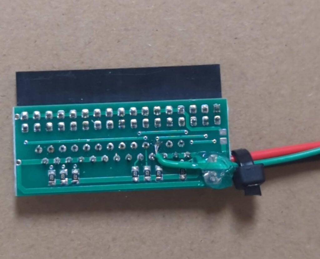 Close-up of FlexiDrive adapter with jumper soldered to pin 6.