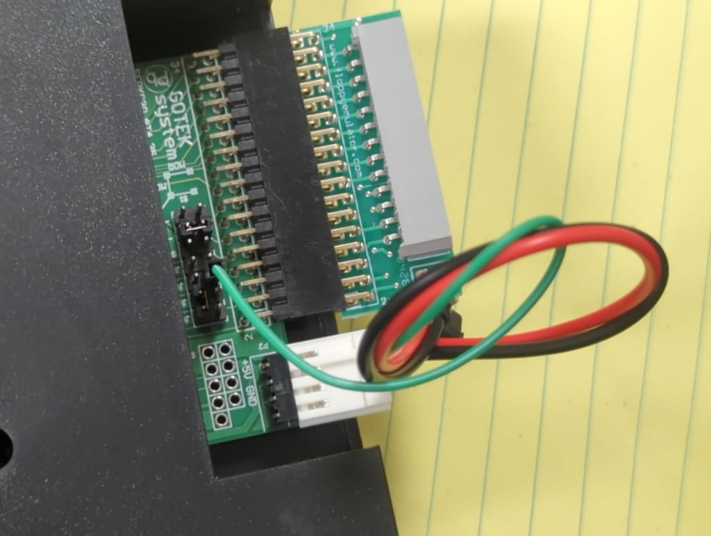 Closeup of FlexiDrive adapter and Gotek with jumper visible.